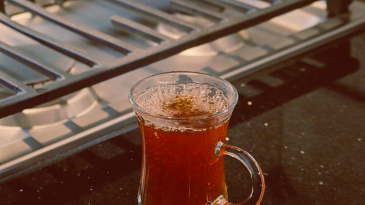 Traditional Suleimani Chai recipe - black tea with spices. Northern Kerala recipe that uses no milk.